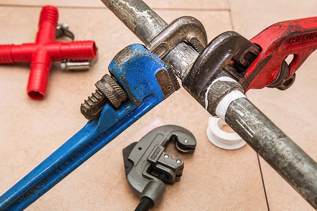 pipes and wrenches used for plumbing work